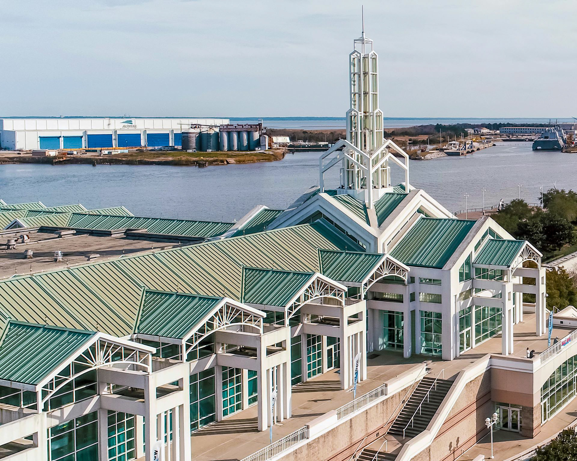 Close view of Mobile Convention Center roofing and riverfront facade